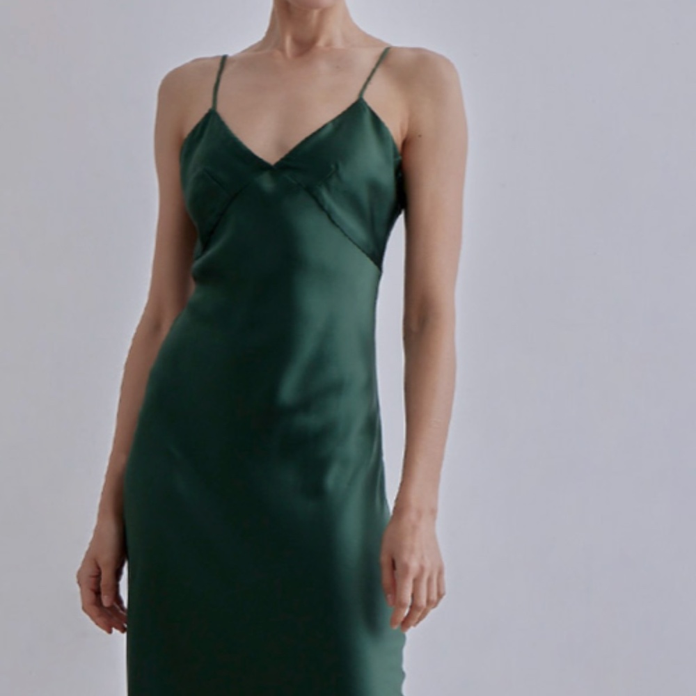 Mid length emerald green silk dress